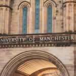 Close-up of the University of Manchester's architectural details with Gothic features.