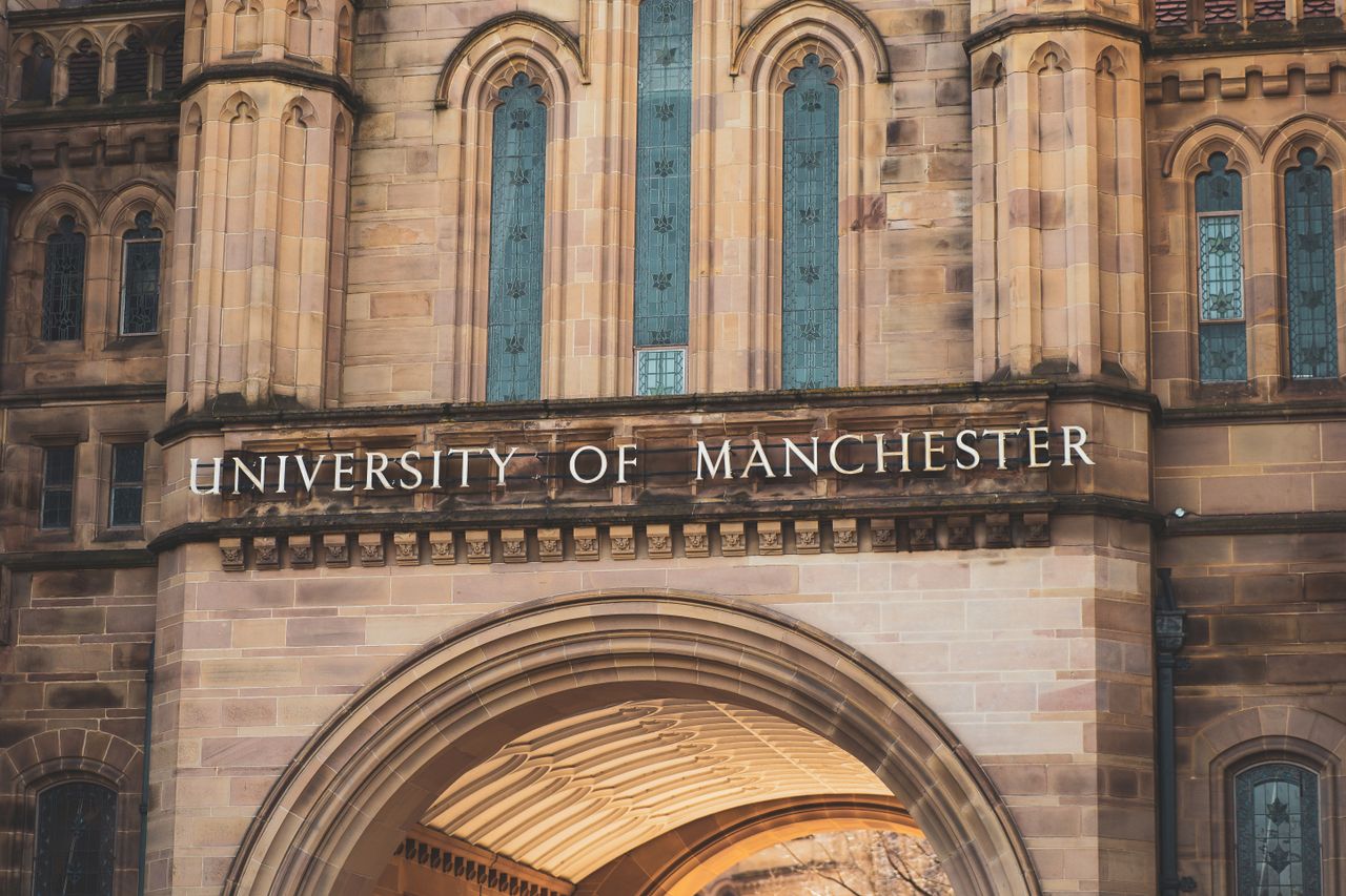 Crafting Captivating Headlines: Your awesome post title goes here Close-up of the University of Manchester's architectural details with Gothic features.